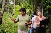 Luis Farfán and Elisabeth Lagneaux from the Wyss Academy for Nature installing soil moisture sensors to monitor agroforestry systems.