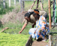 ENLITE Youth Group members tend seedling beds at the Gambella wetland nursery, where young people are building practical skills for restoration and future planting.