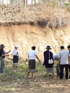 Teachers at a school in Xayabury Province review seedlings and cuttings, linking everyday school routines with environmental education.