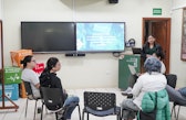 During the kickoff meeting for the Castaña del Futuro project at the Wyss Academy, project lead Diana Miranda presents the initiative to the team.