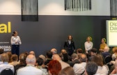 Moderator Rita French on stage with three speakers during the opening of Diplomacy Day at the Locarno Film Festival.