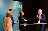 Martina Hirayama, Barbara Dubach, and Brian O'Donnell in conversation with moderator Yves Daccord, at the Wyss Academy's Beyond5 event, Kursaal Bern.