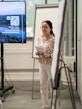 Kattia Diaz stands beside a presentation screen during a session at the 2026 SOR4D Conference.