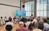 Lucila speaks to panelists and audience members during a workshop session at the 2026 SOR4D Conference.