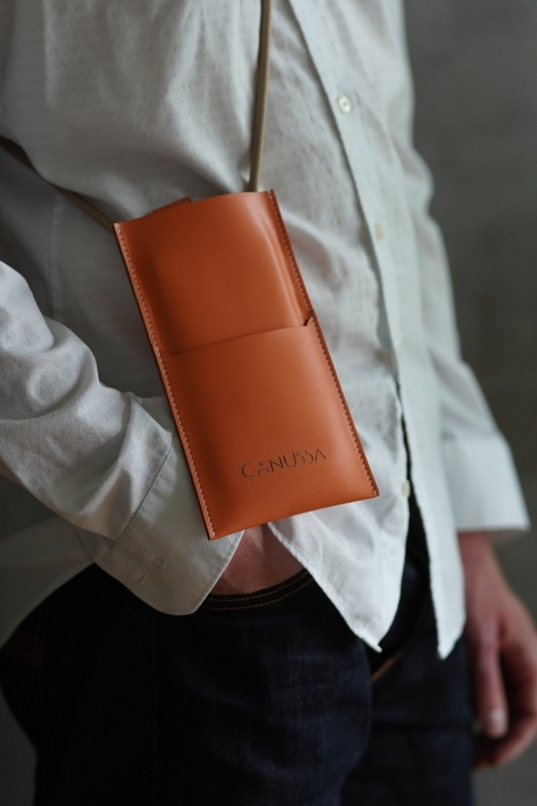 Man in White Dress Shirt Wearing Canussa Cross-Body Bag