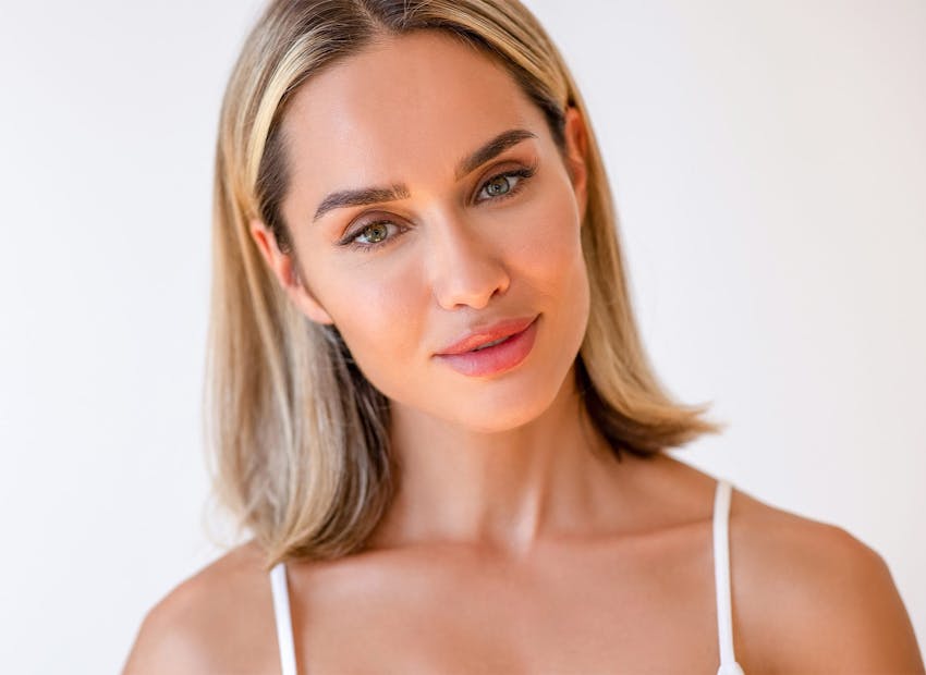 woman with short hair with green eyes