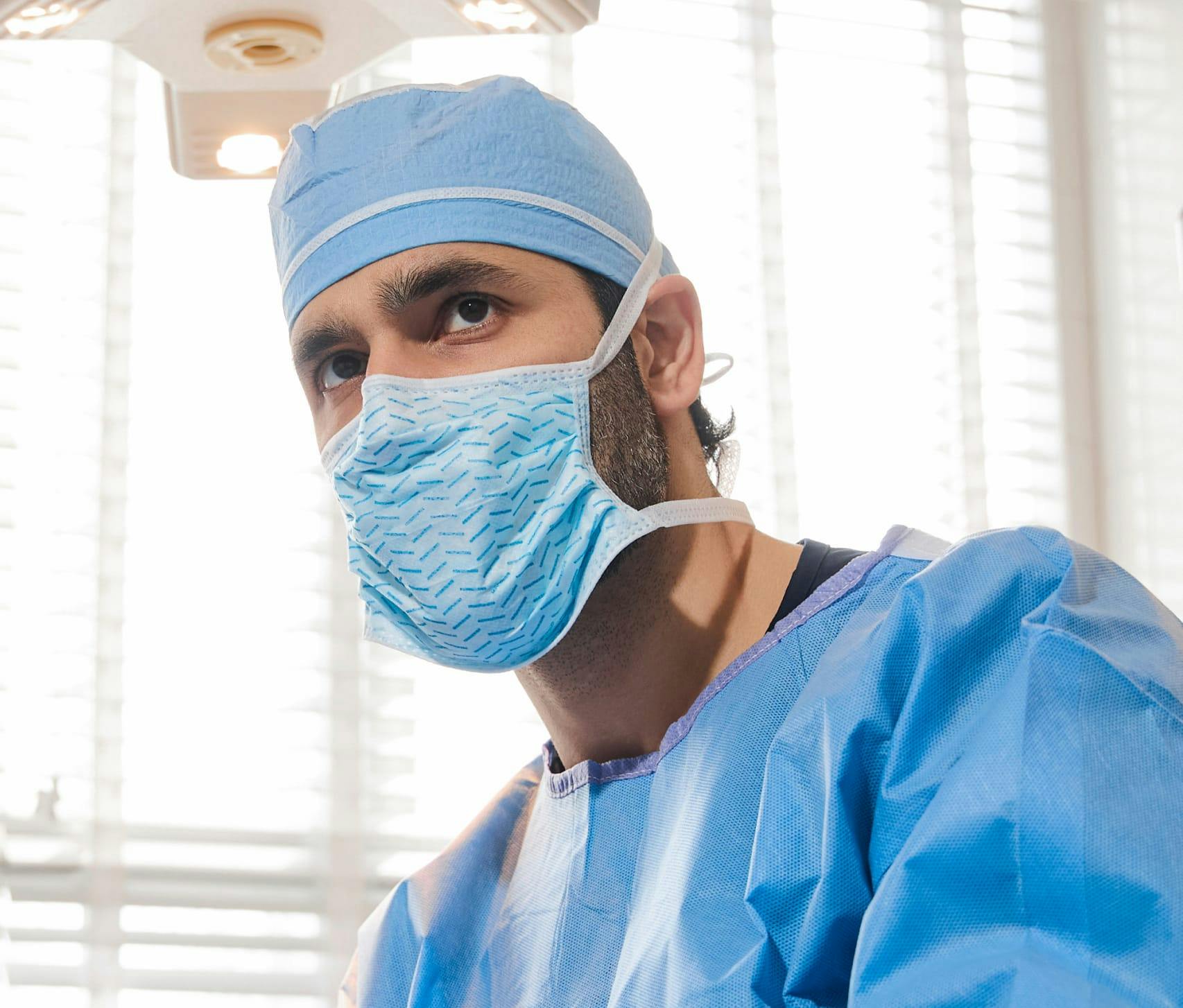 Dr. Alemi in surgical clothes