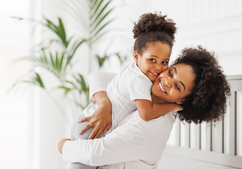 mother and daughter hugging