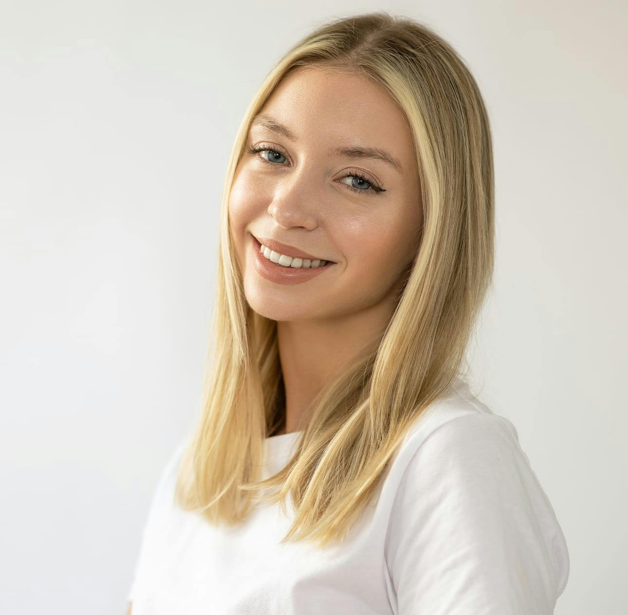 woman with blonde hair smiling
