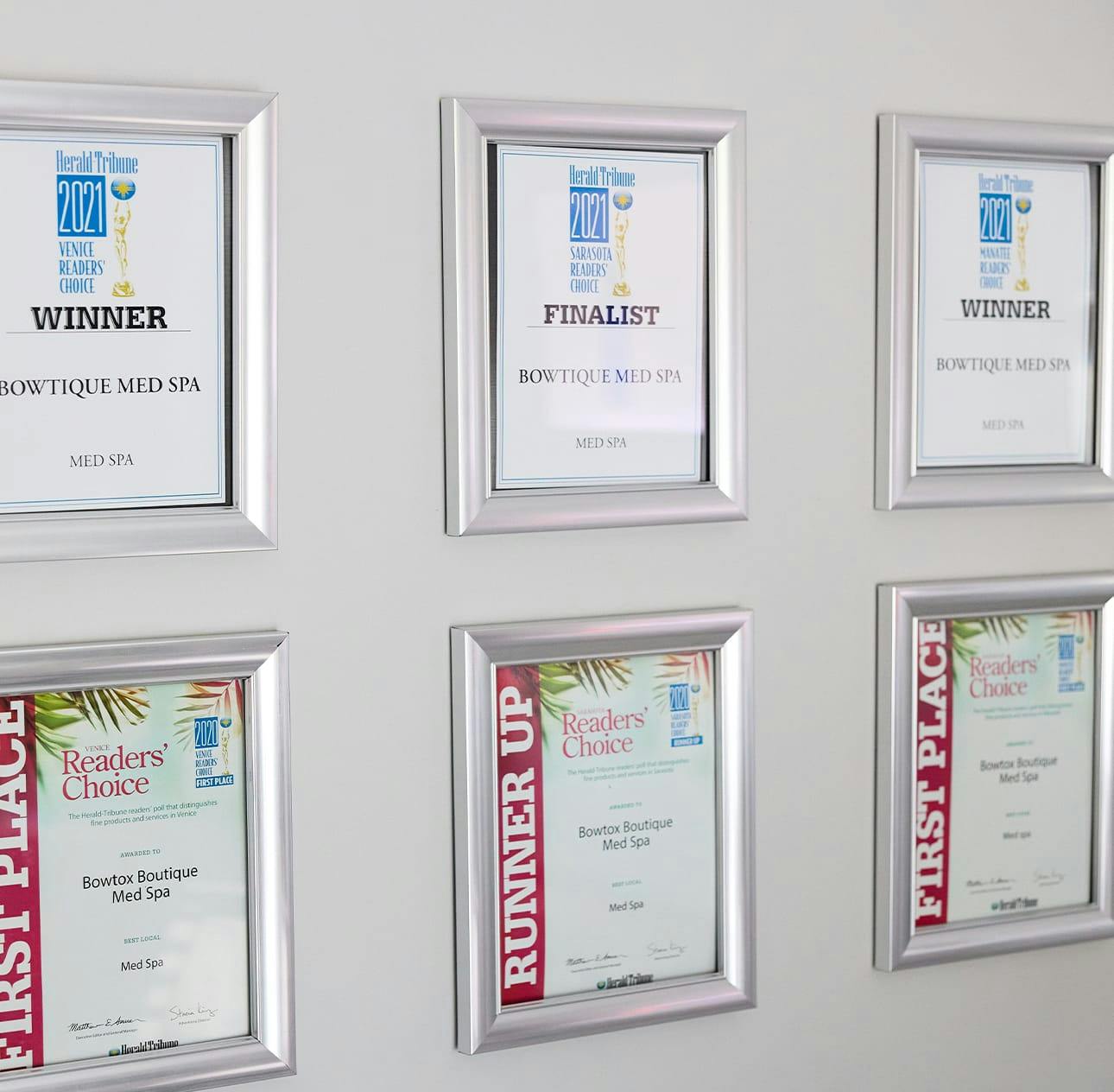 awards on a wall
