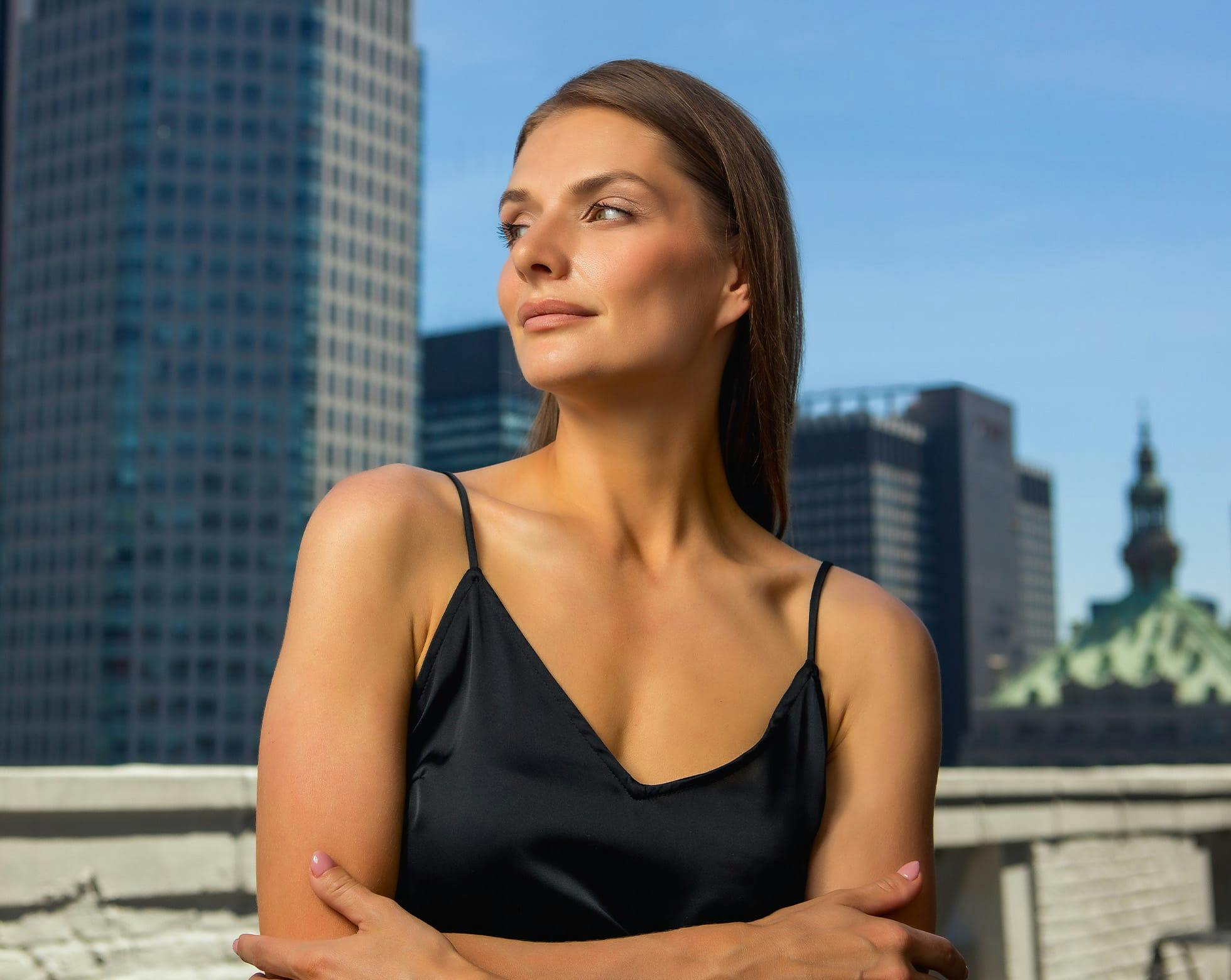 Woman smiling on a balcony