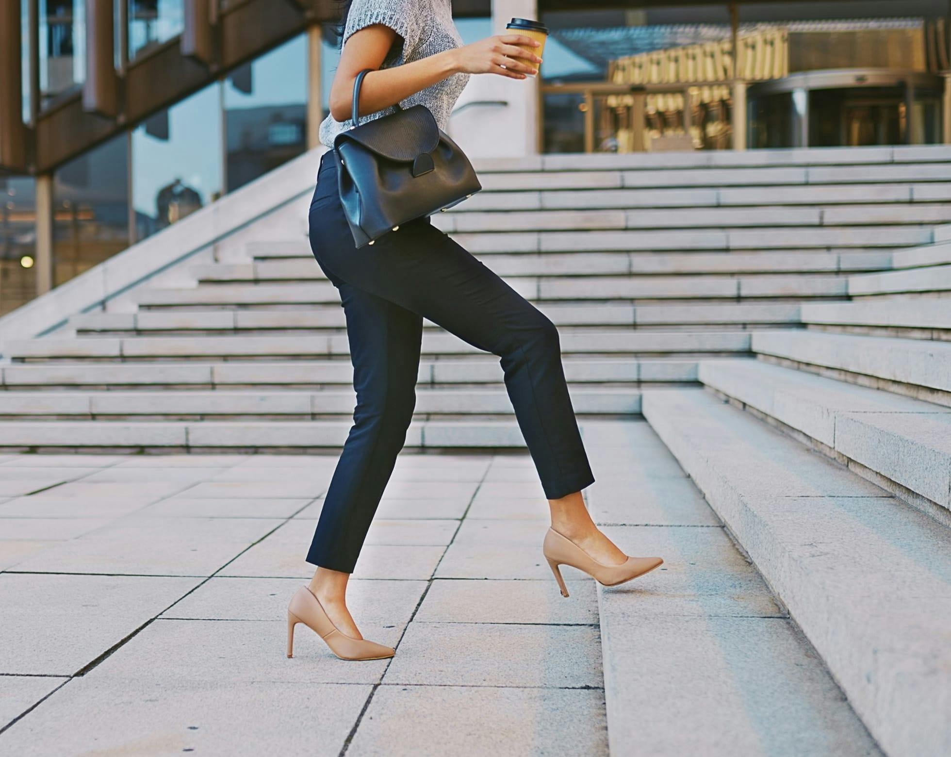 Woman walking up the stairs