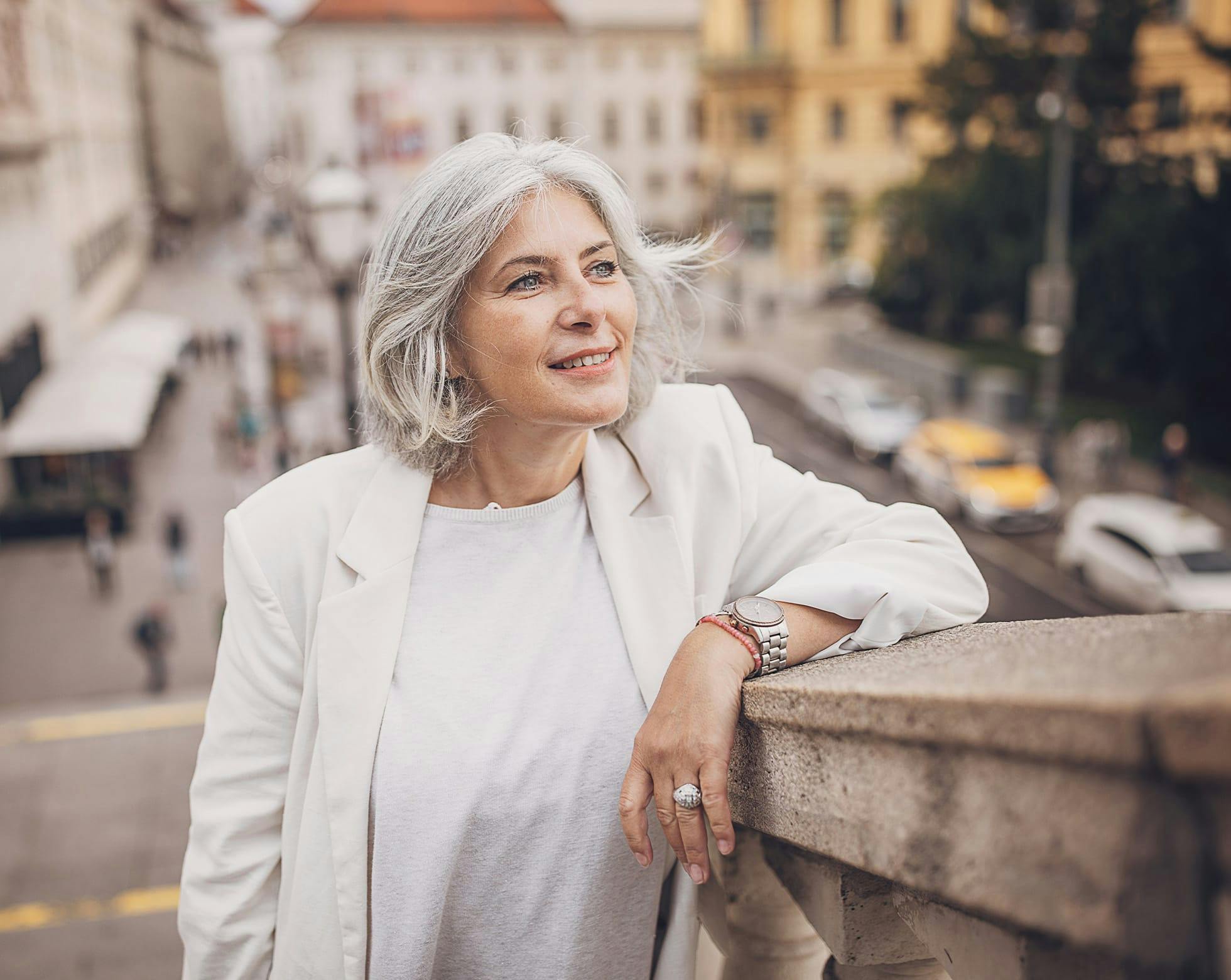 Woman leaning on a wall