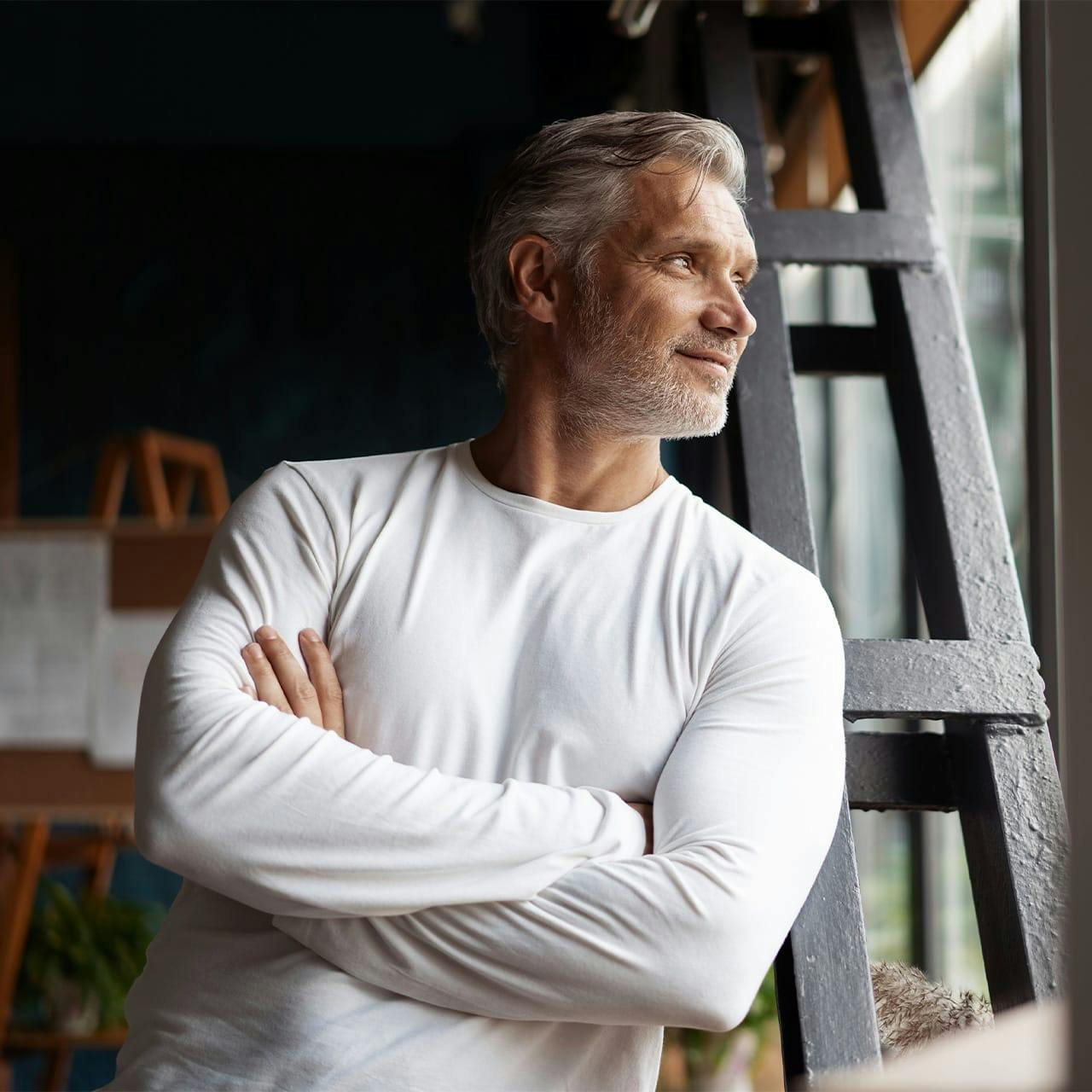 smiling man looking outside