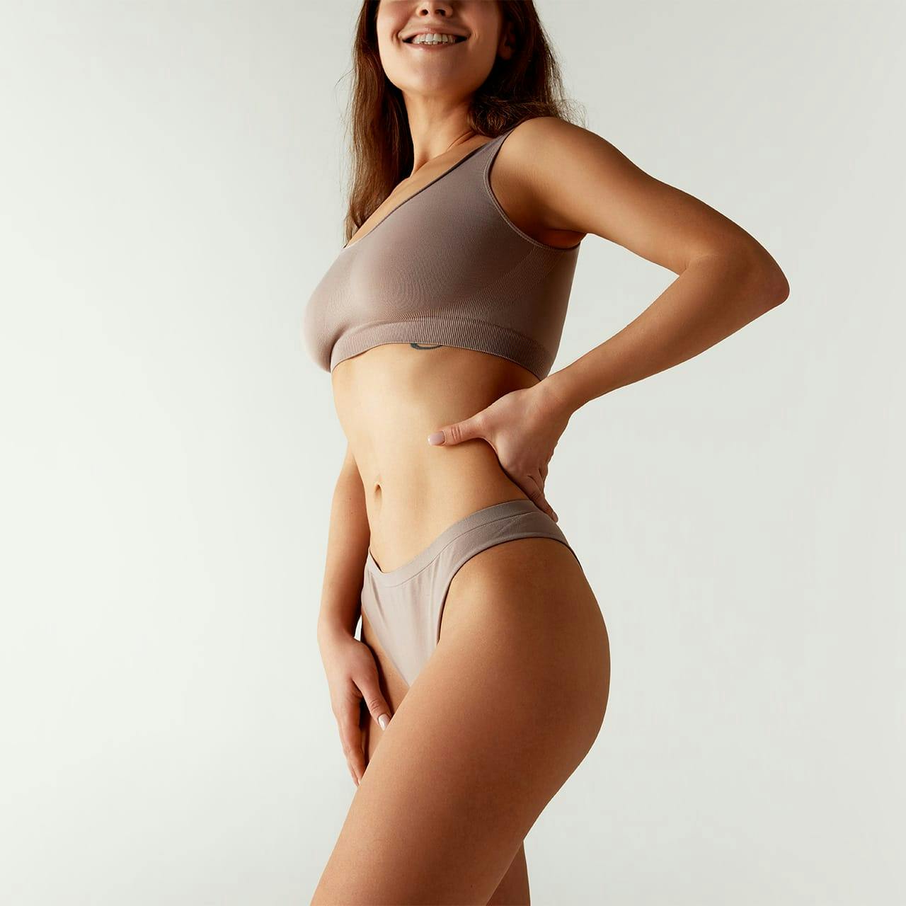 woman in mauve undergarments