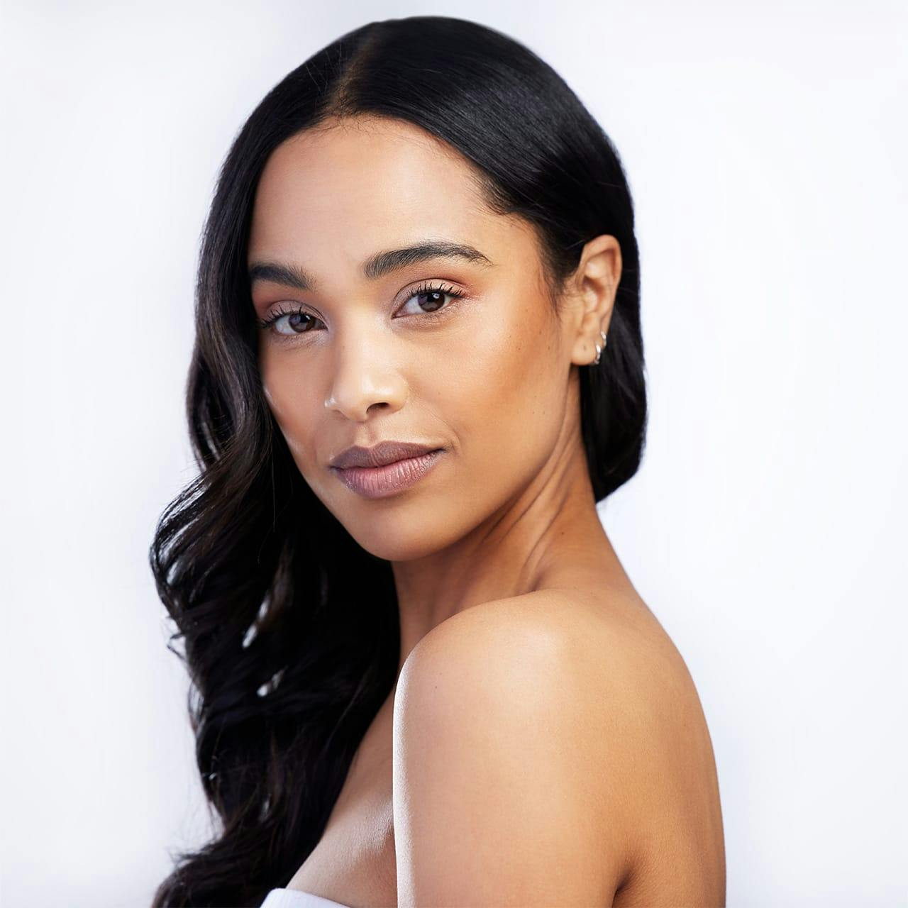 woman with head turned to side