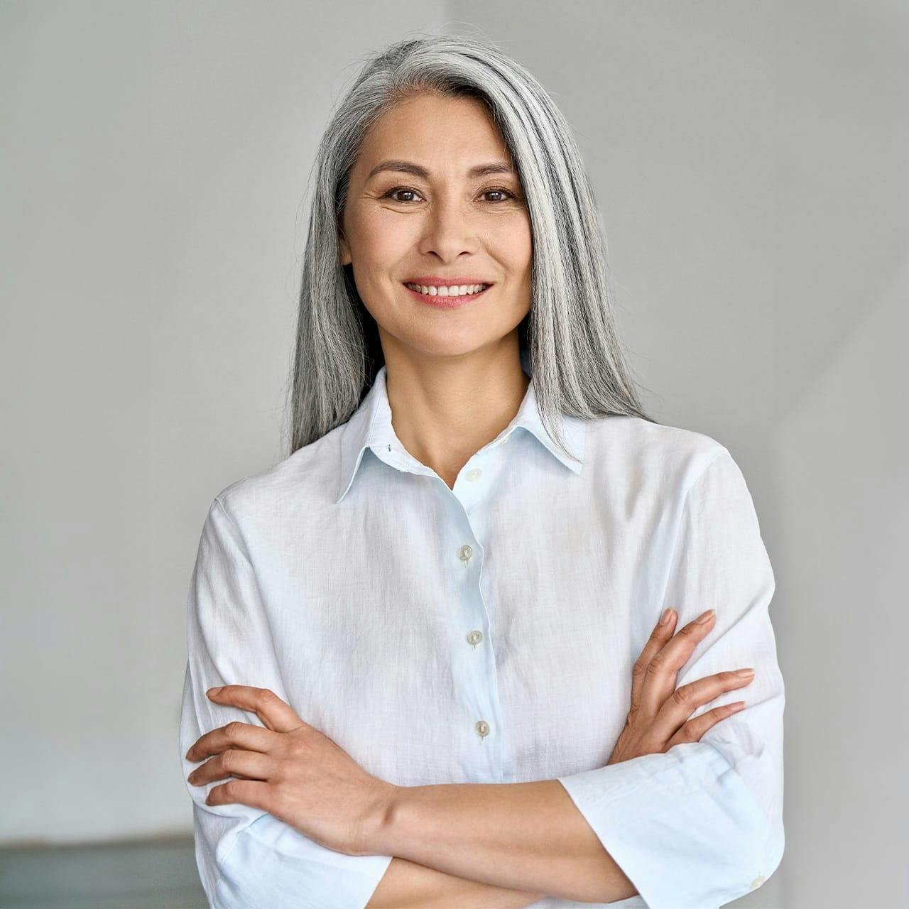 woman standing with arms crossed
