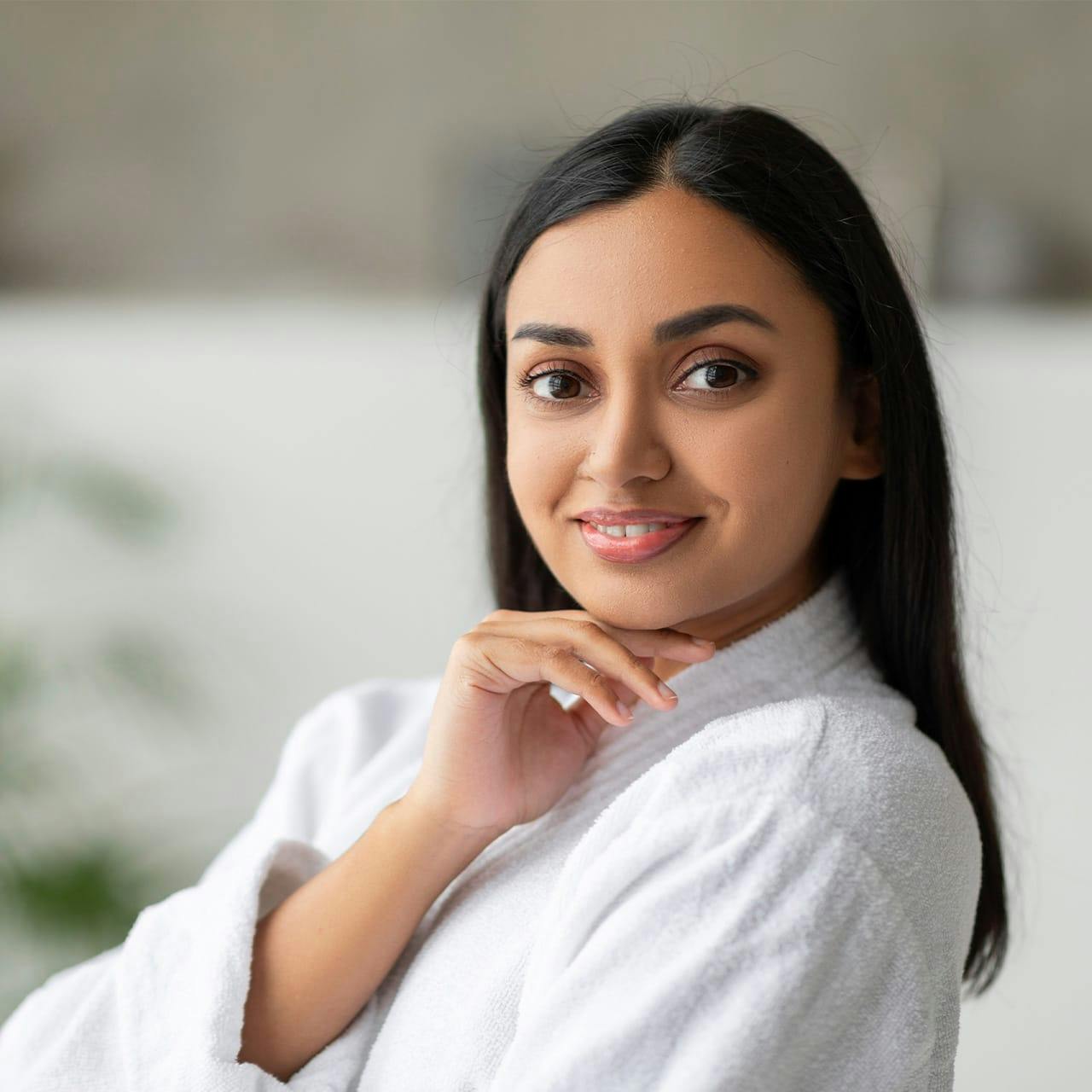 smiling woman in robe