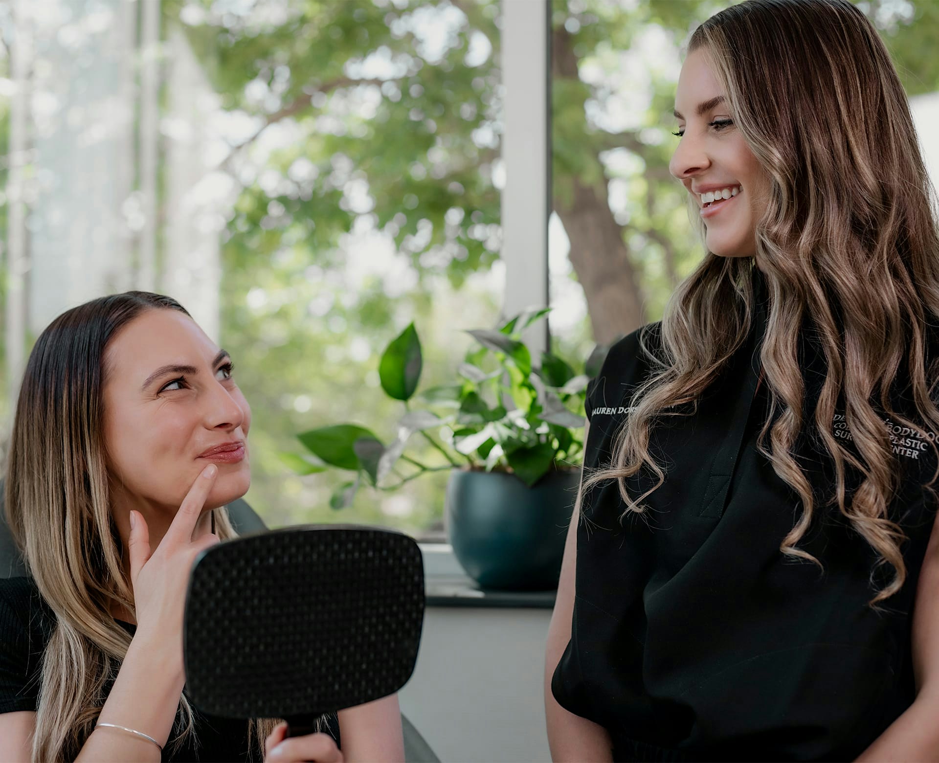 staff and patient smiling