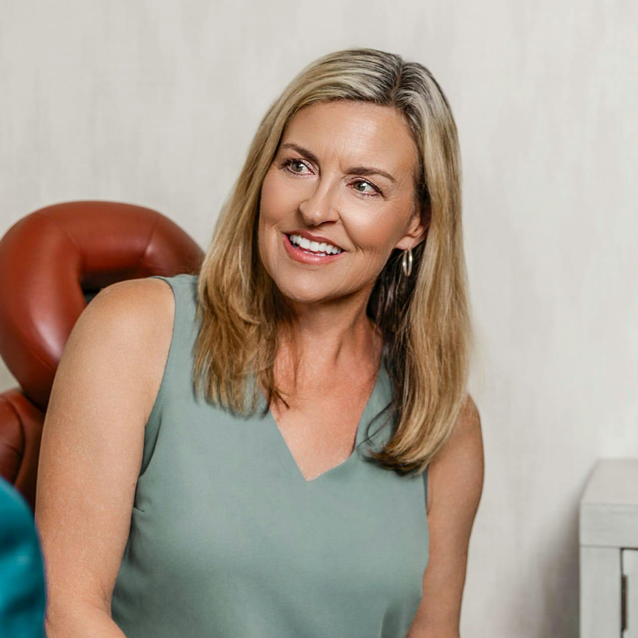 woman with blonde hair smiling