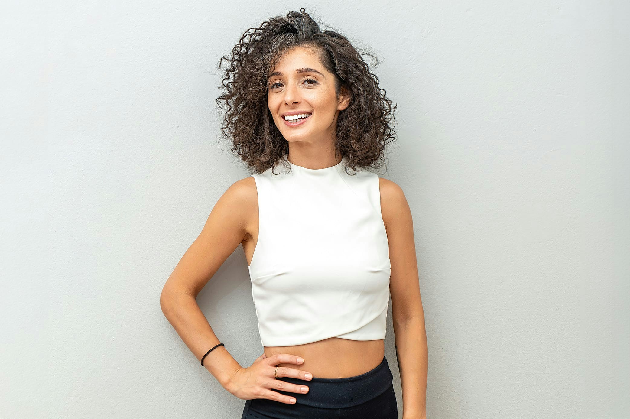 woman standing with hand on hip