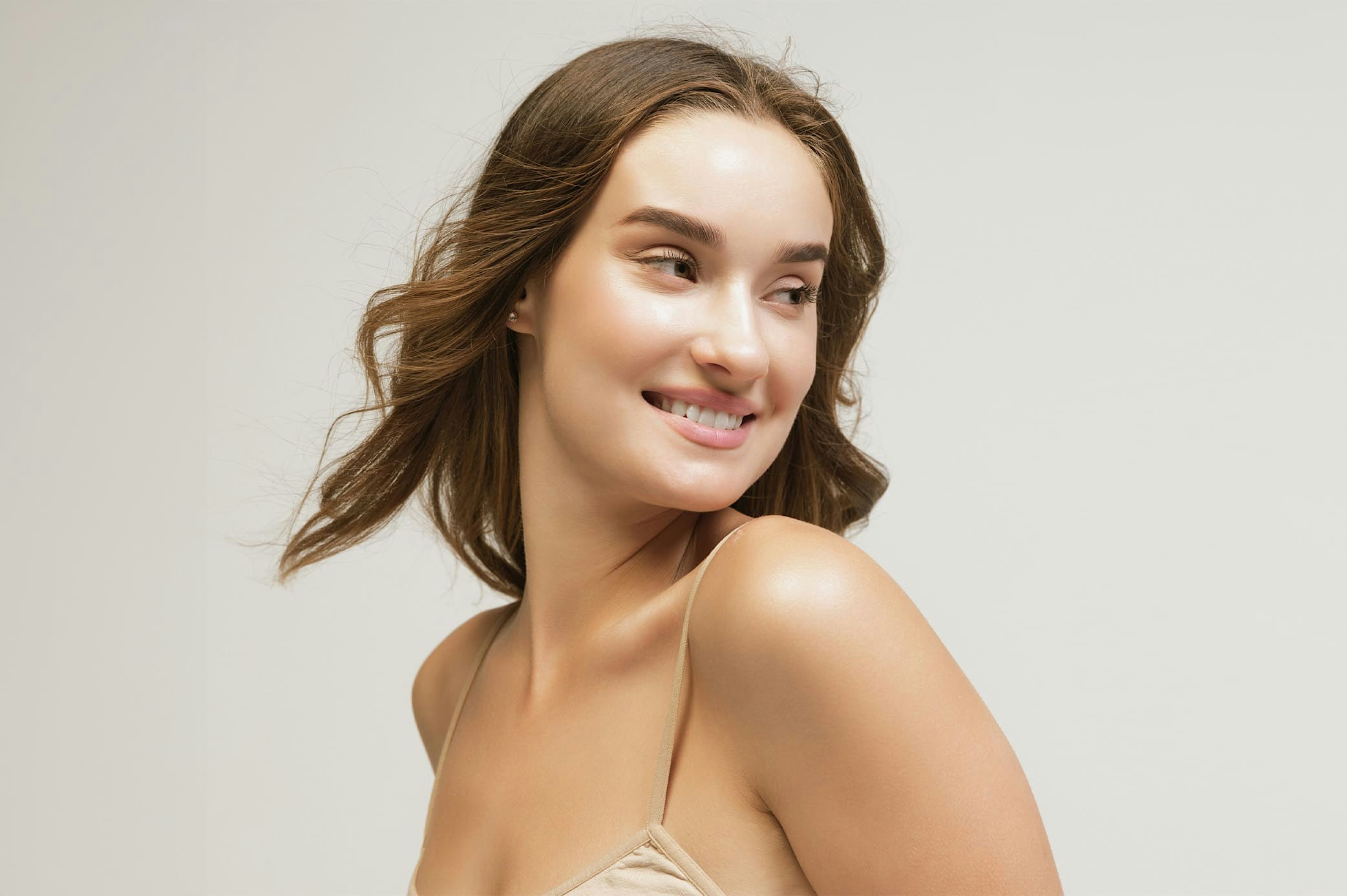 woman with head turned slightly downwards