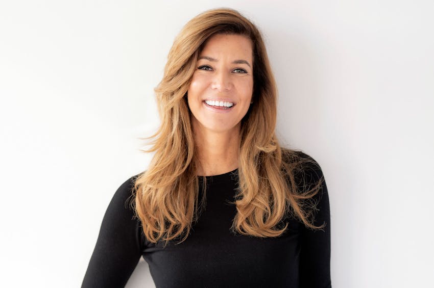 smiling woman in black shirt