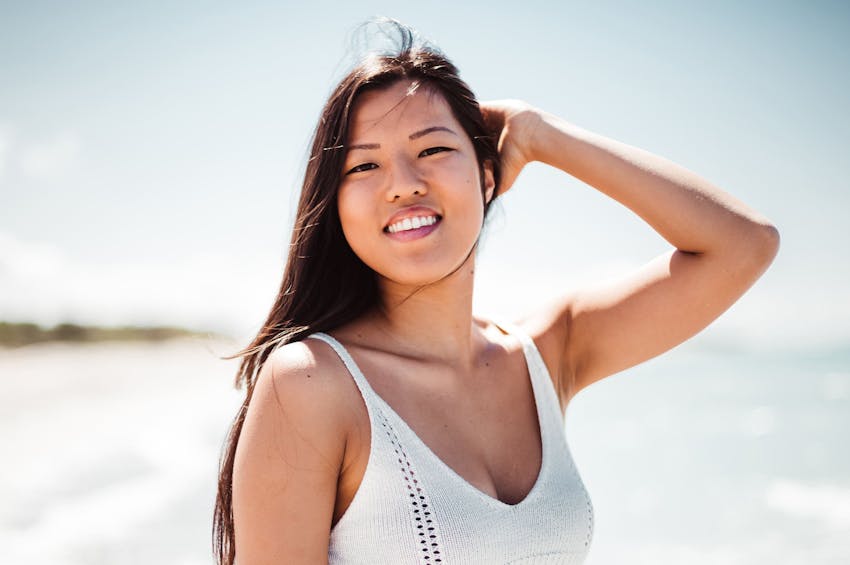 woman smiling at beach