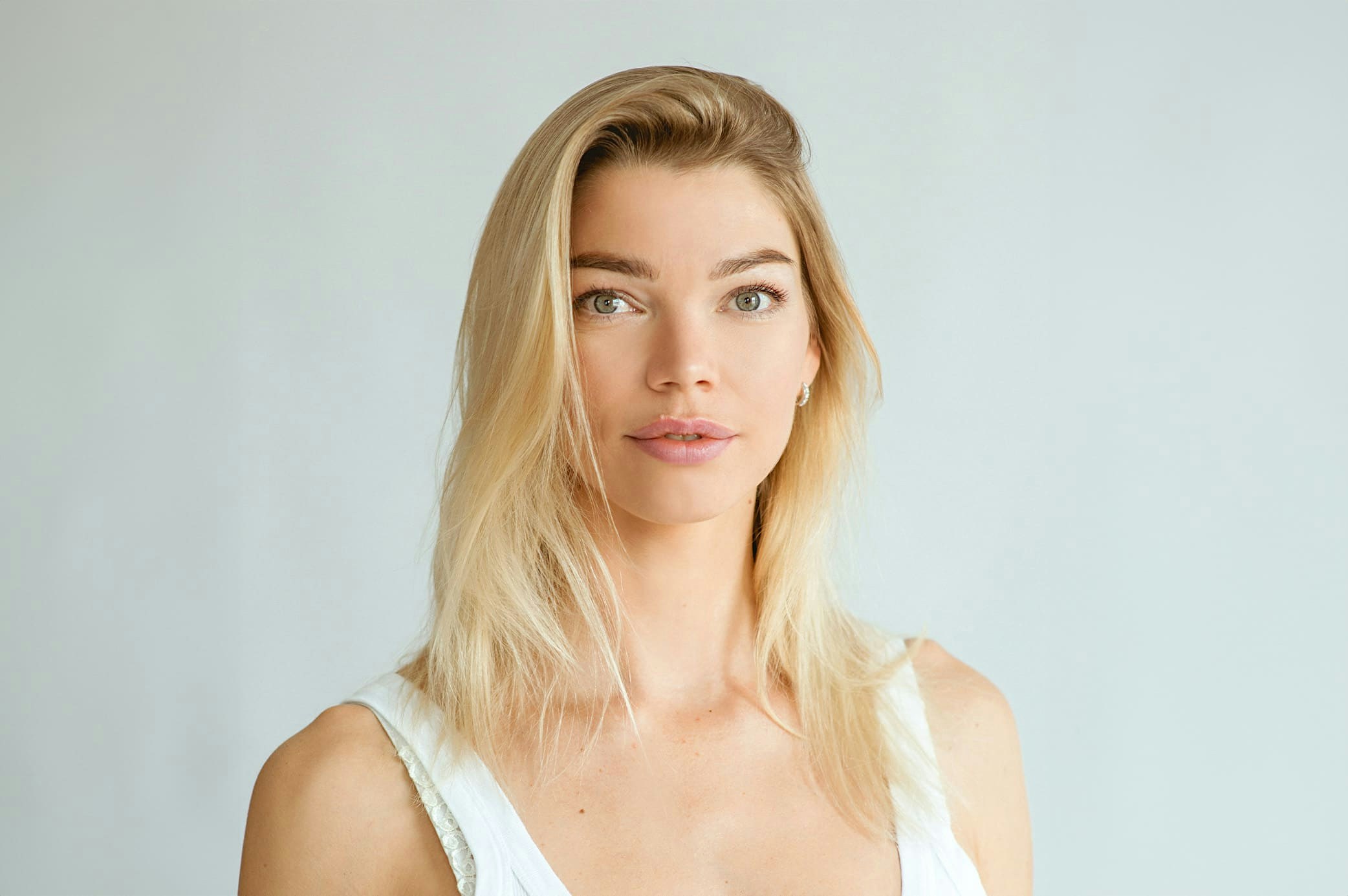 woman in white tank top