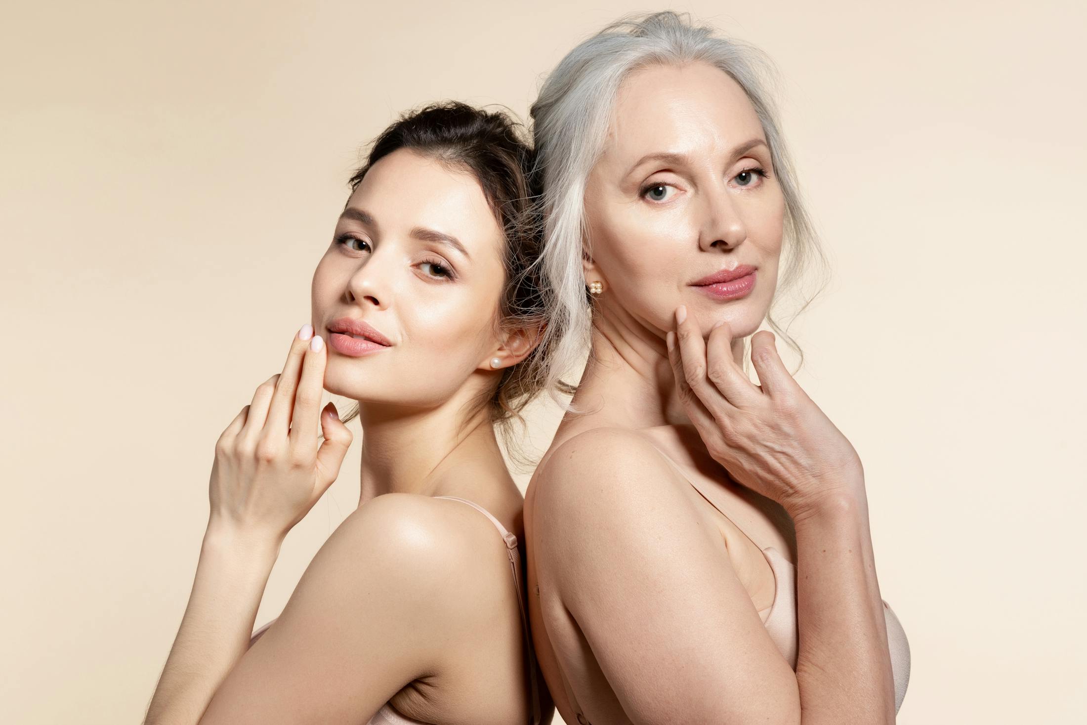 Elderly and young women with smooth skin and natural makeup