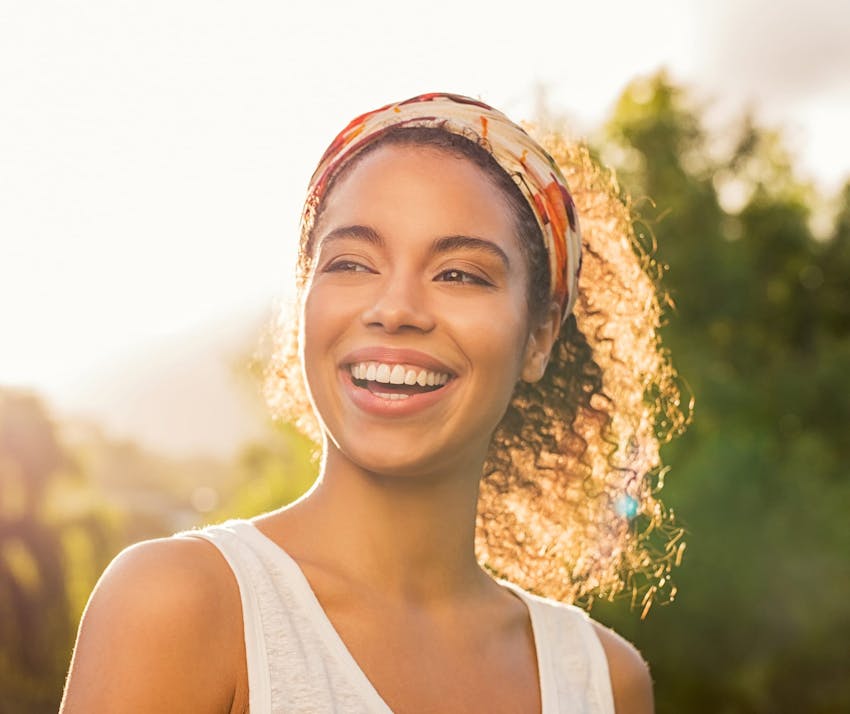 Woman laughing outside