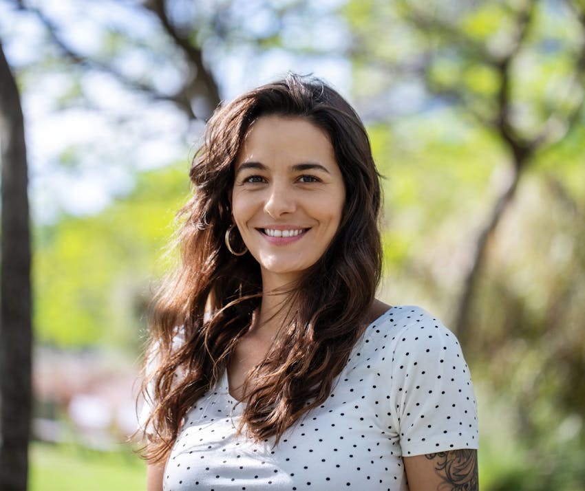 Woman smiling outdoors