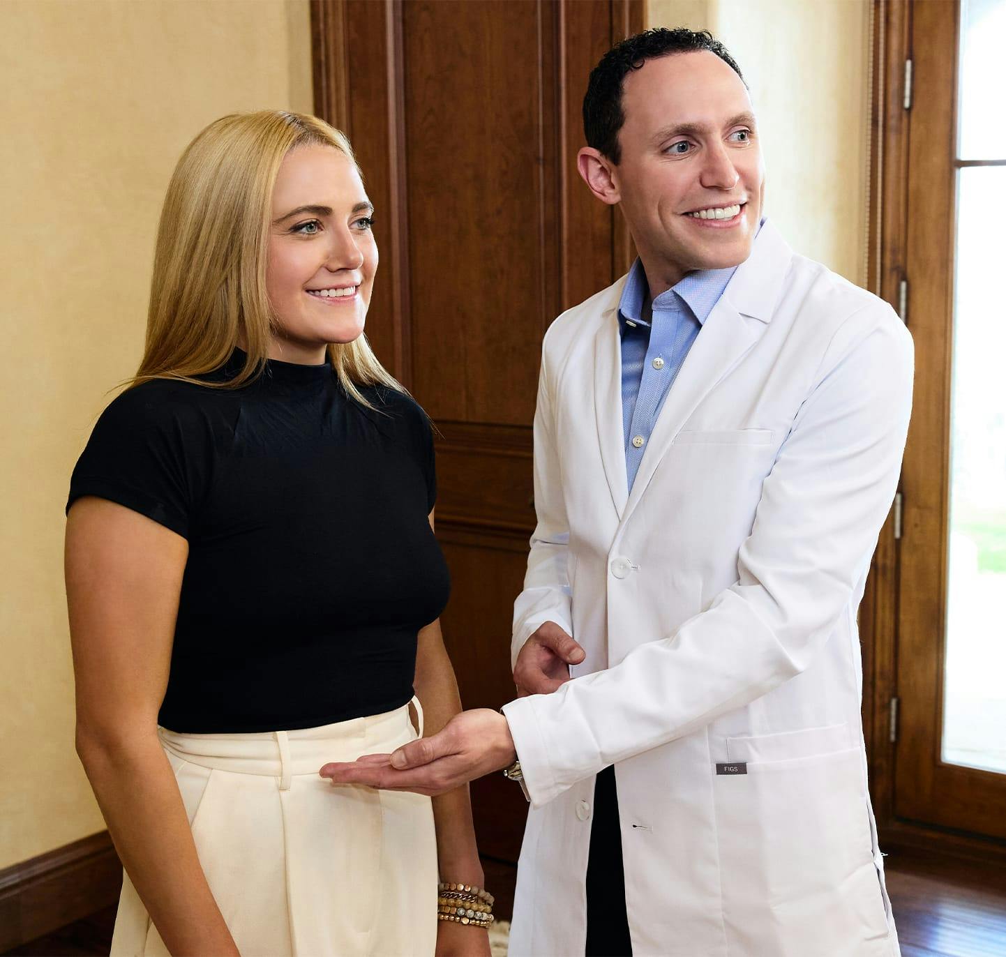 Dr. Cohen with a female patient