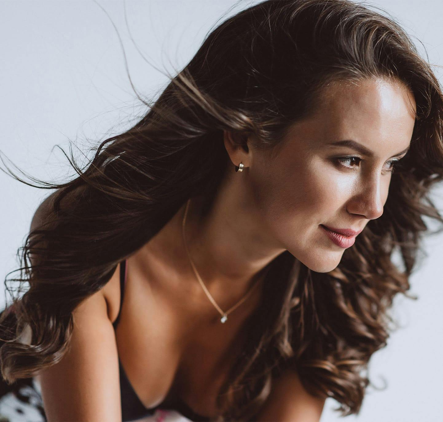 Woman with wavy brown hair