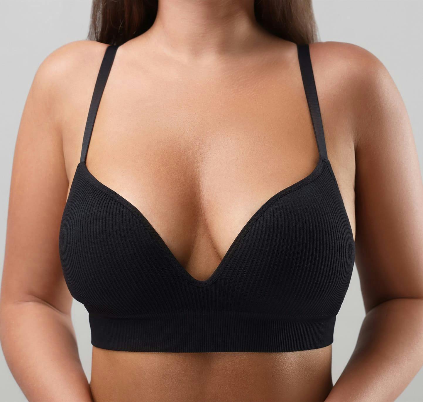 Woman's chest in black bra