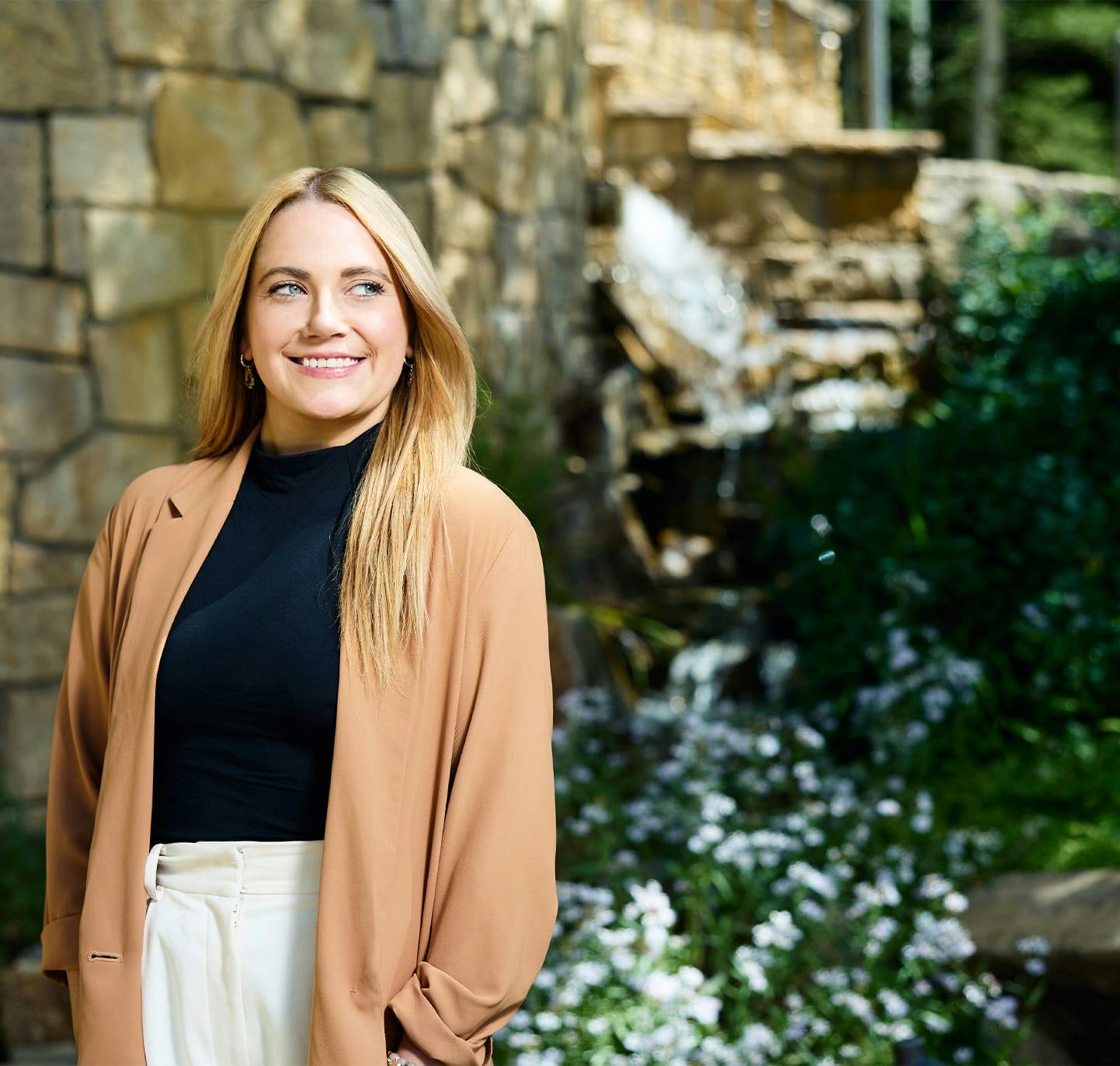 Woman smiling and glancing to the left