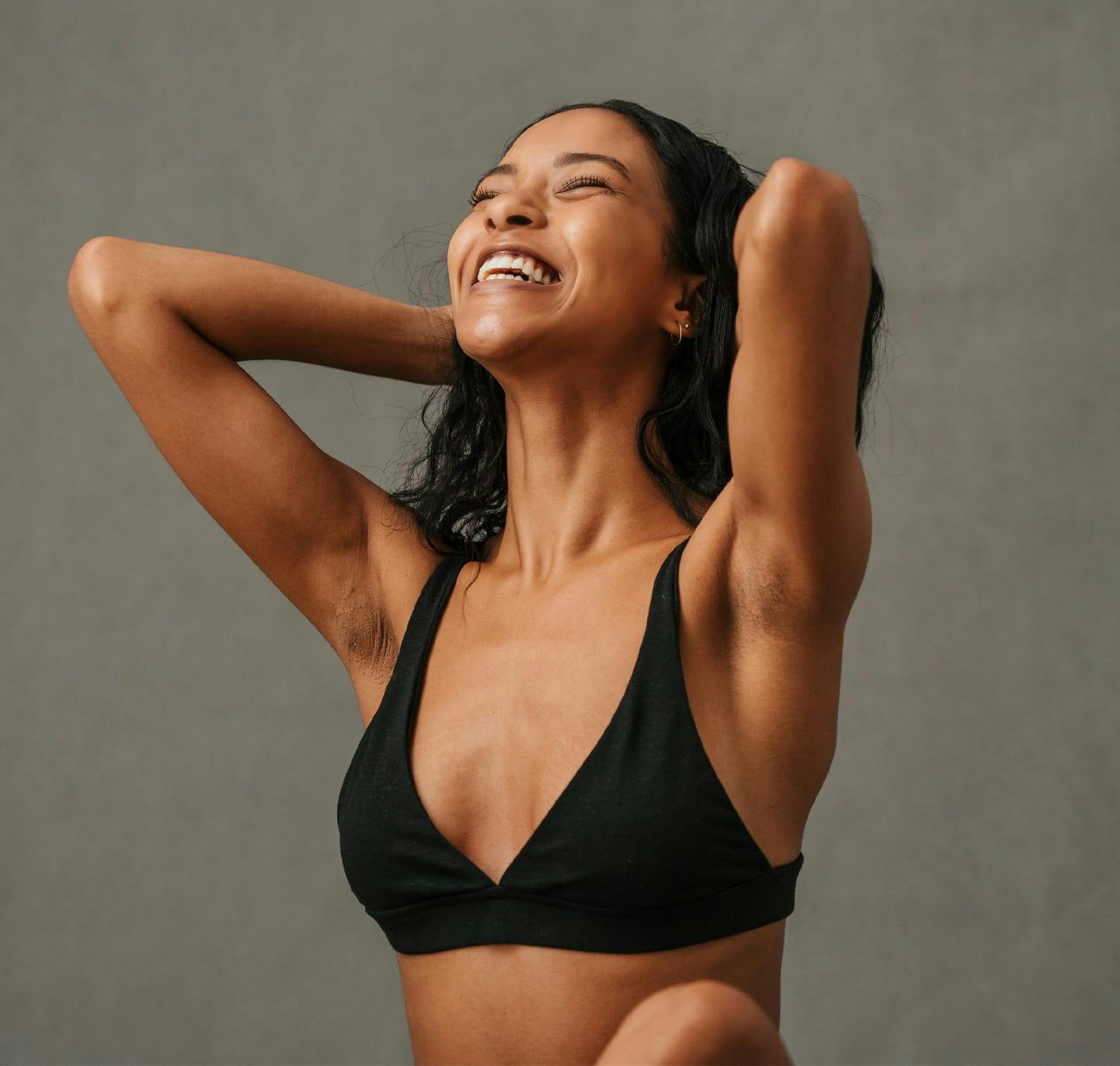 Woman posing in black underwear