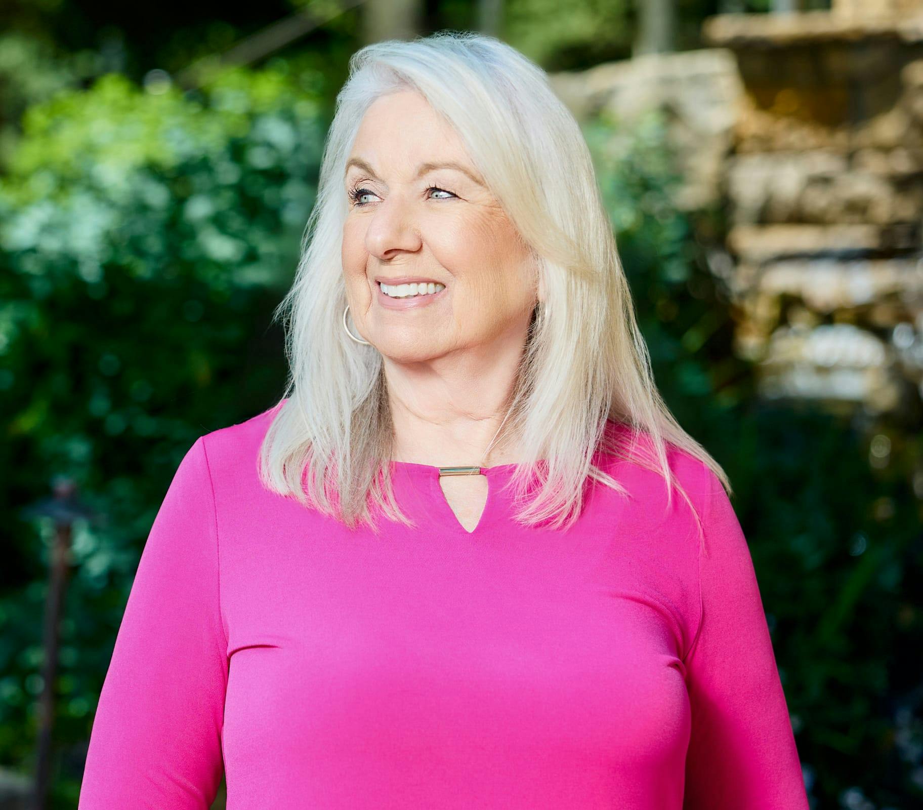 woman in a pink shirt