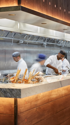 wagamama kitchen with chefs cooking