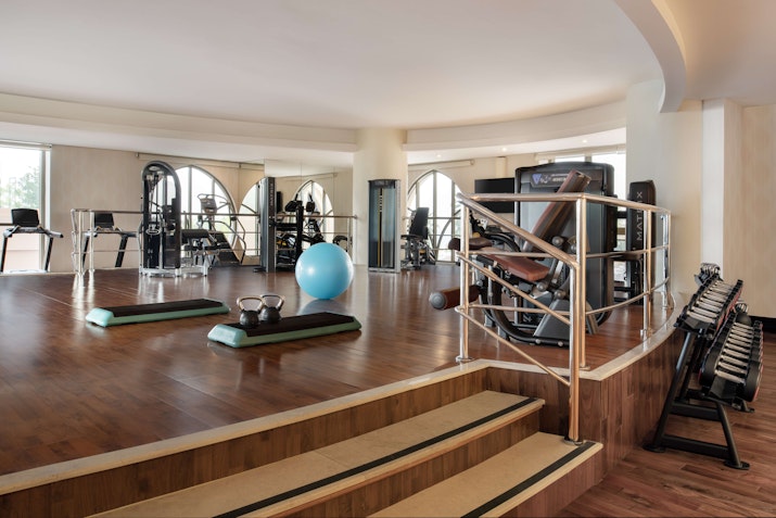 Modern gym with fitness equipment and a workout area