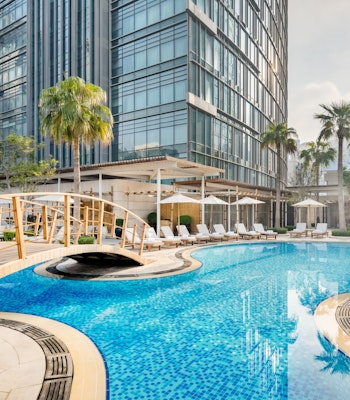 JW Marriott Marquis City Center Doha Swimming pool with bridge over the water