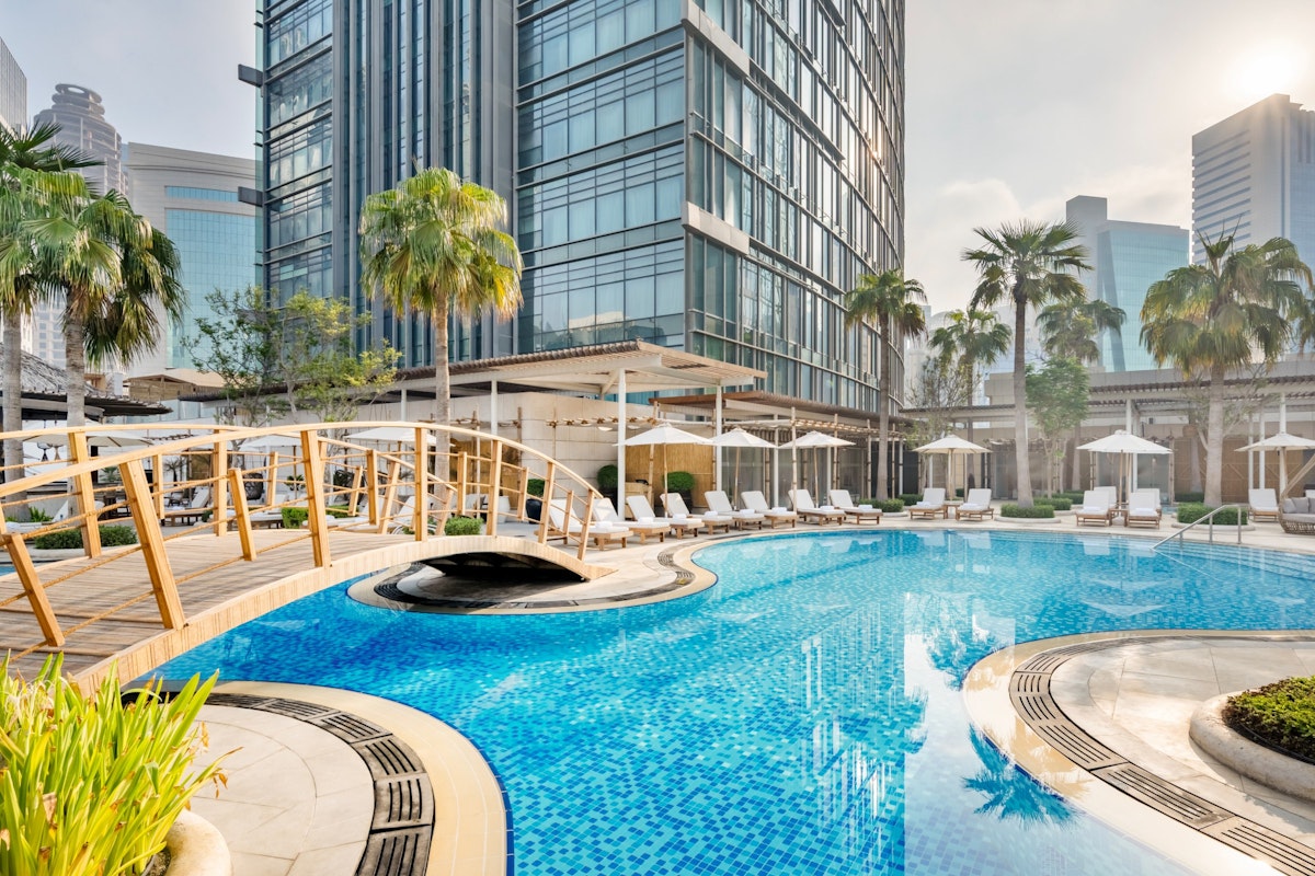 Swimming pool with bridge over the water