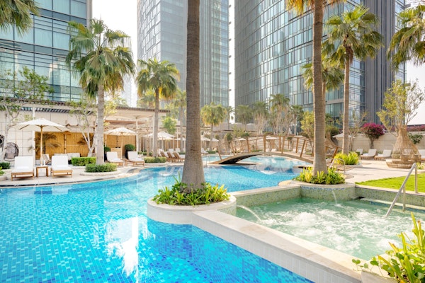 Swimming pool with palm trees