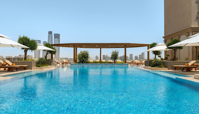 Le Royal Méridien Place Vendôme Lusail Swimming pool with blue skys