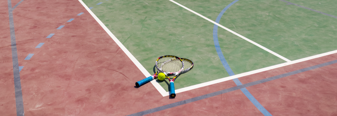 tennis rackets on tennis court