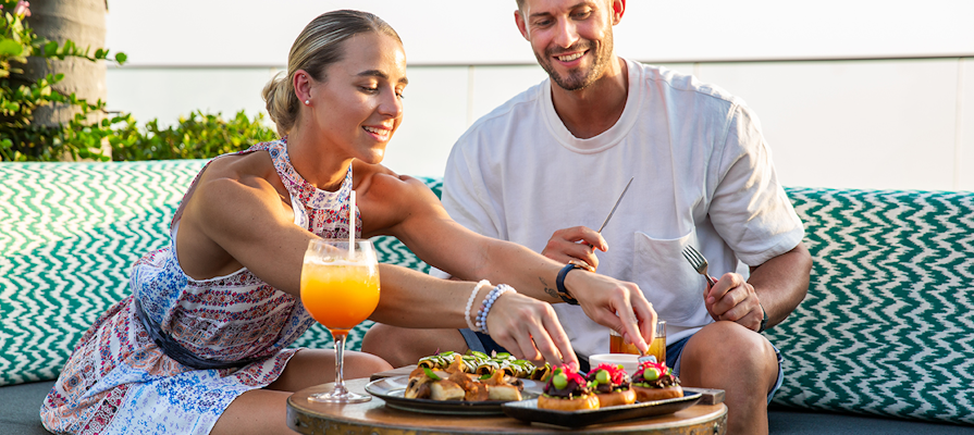 Couple enjoying alfresco dining
