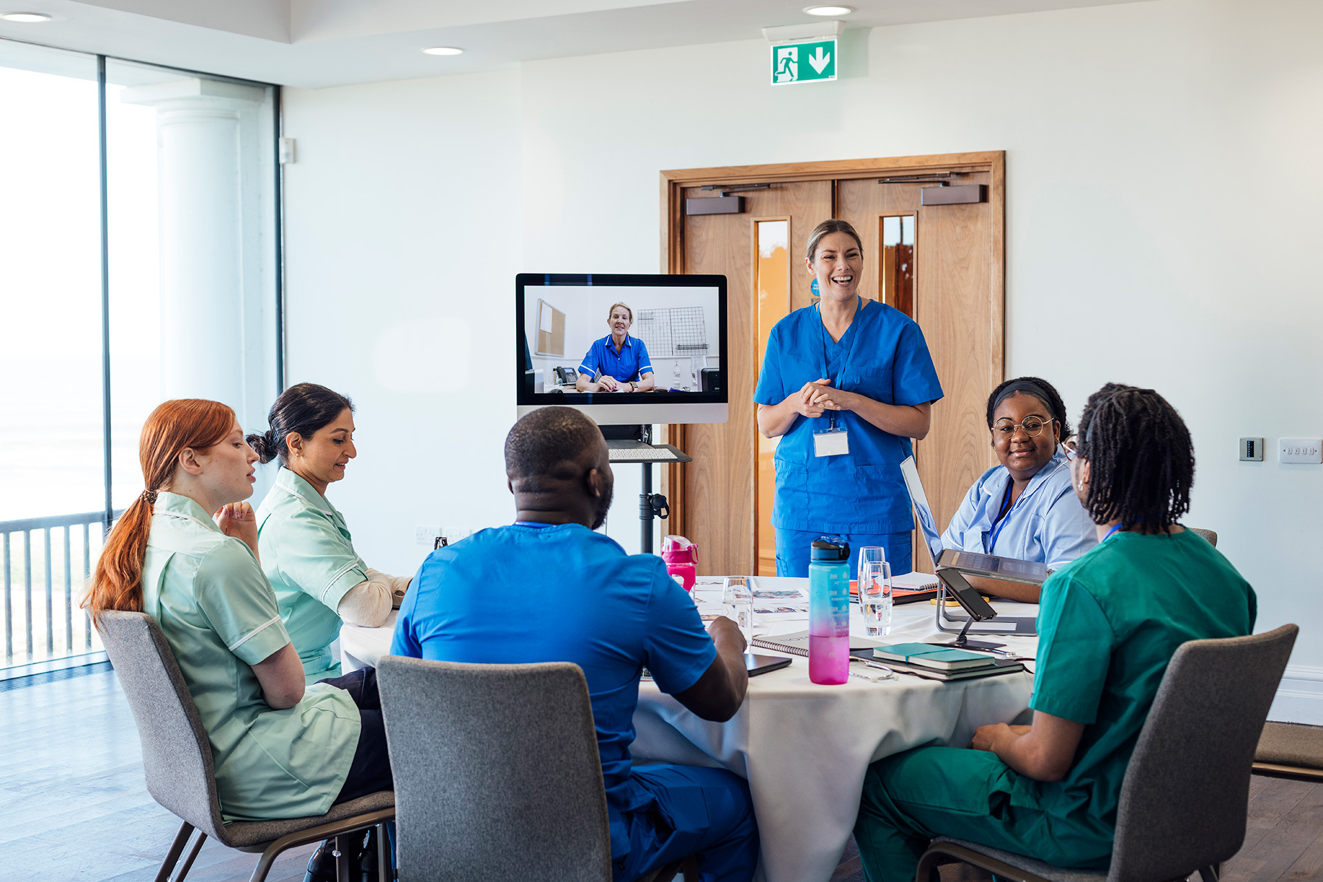 Hospital staff, nurses and doctors collaborating remotely