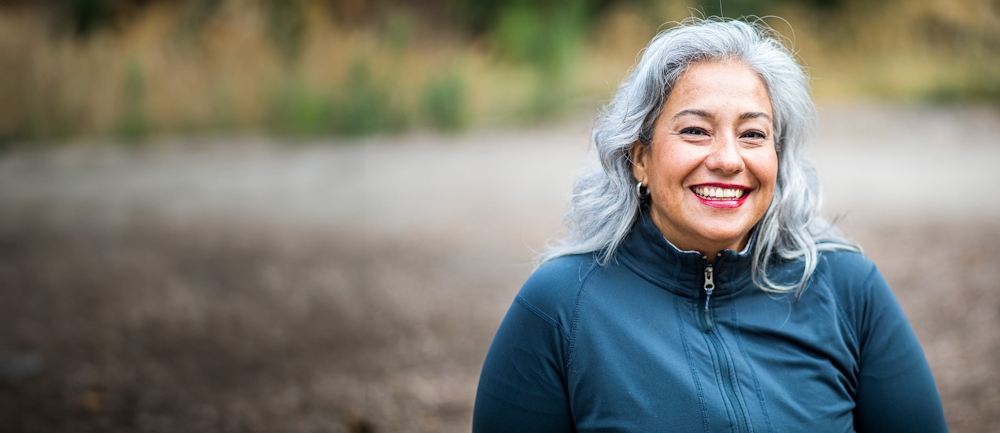 woman smiling outside