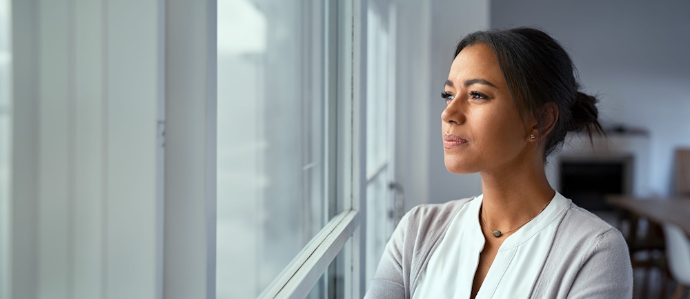 woman looking outside
