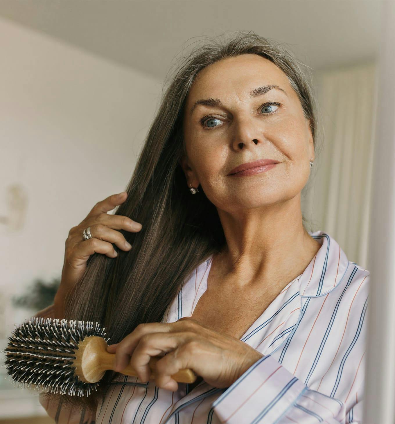woman brushing hair